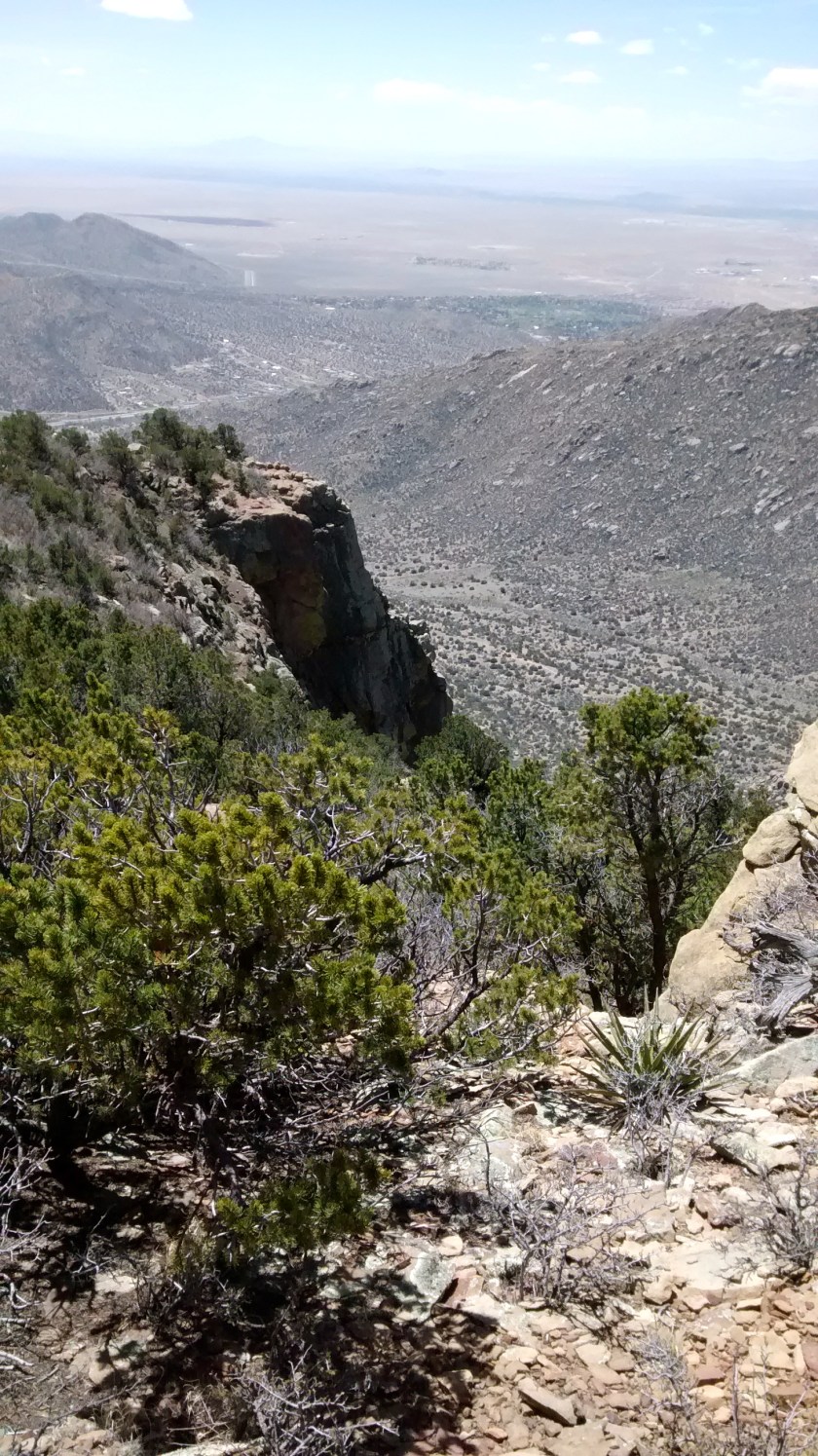 Below this cliff is the Three Gun Springs Trail.