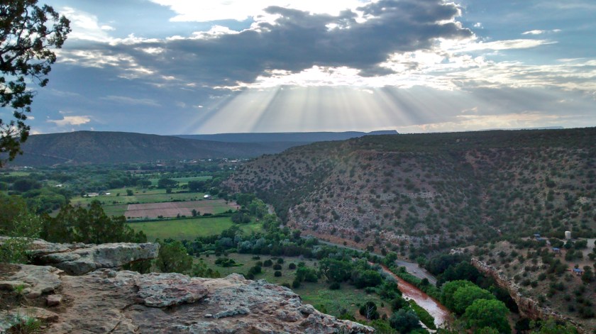 Sunset at Villanueva State Park from trail on top of bluffs.
