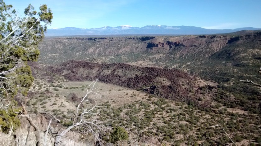Looking towards Santa Fe across the canyon to the first snowfall of the season on the Sangre de Cristo Mountains.