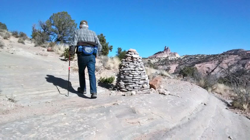 A cairn on the Pyramid Rock Trail with Church Rock to the right.