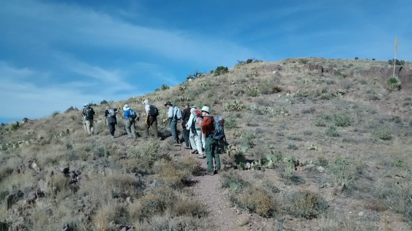 Less than a mile around this hill and up another ridge to get to the top.