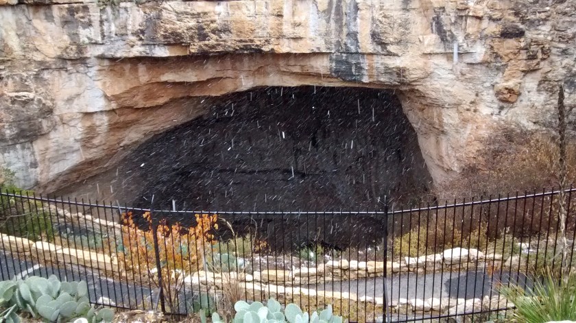 Heading for the natural entrance to the caverns to escape the snow.