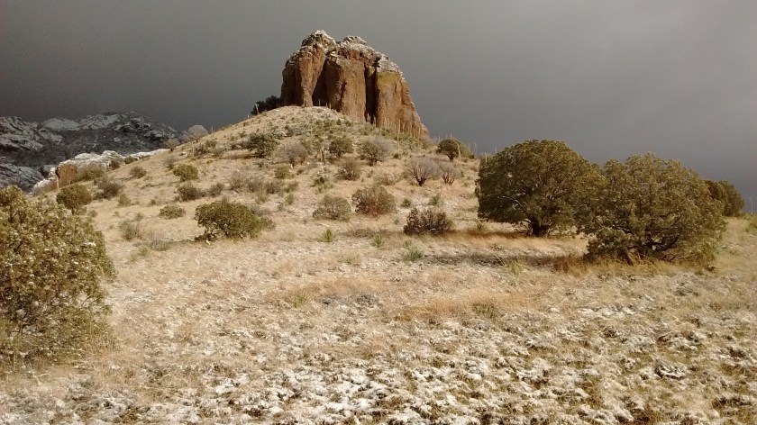 Not sure if this prominent rock has a name. We saw 3 people with a couple of dogs exploring the base.